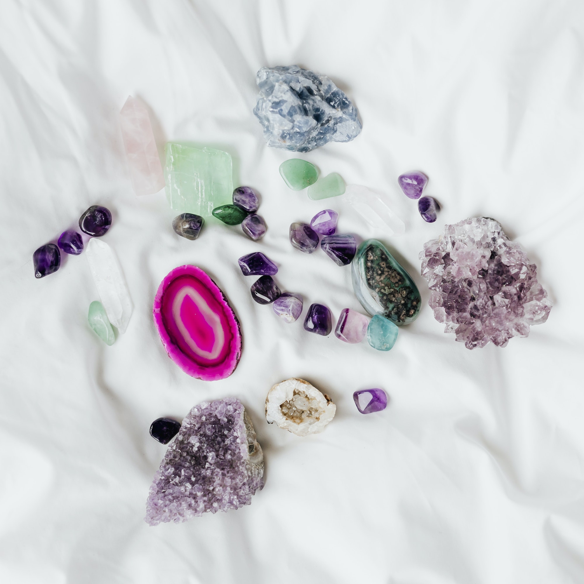 Colorful healing crystal on a blanket - Melanie Holden Psychic Energy Healer, Physical Therapist, and Reiki Master Teacher