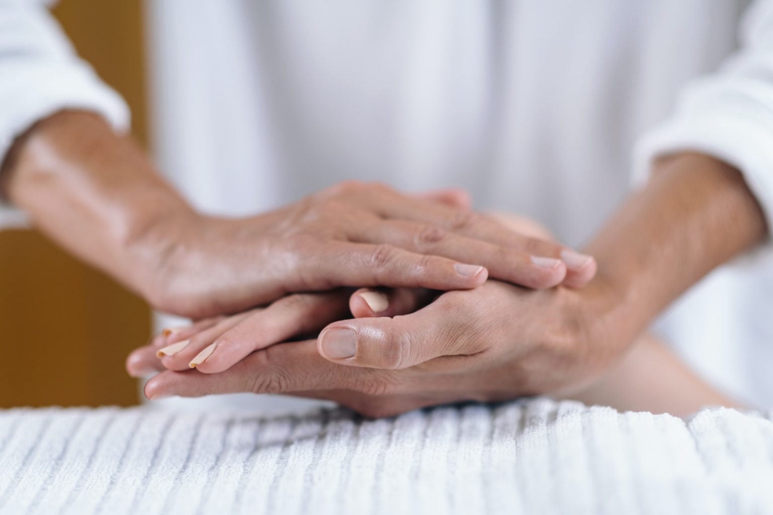 Holding hands at reiki healing treatment - Melanie Holden Psychic Energy Healer, Physical Therapist, and Reiki Master Teacher
