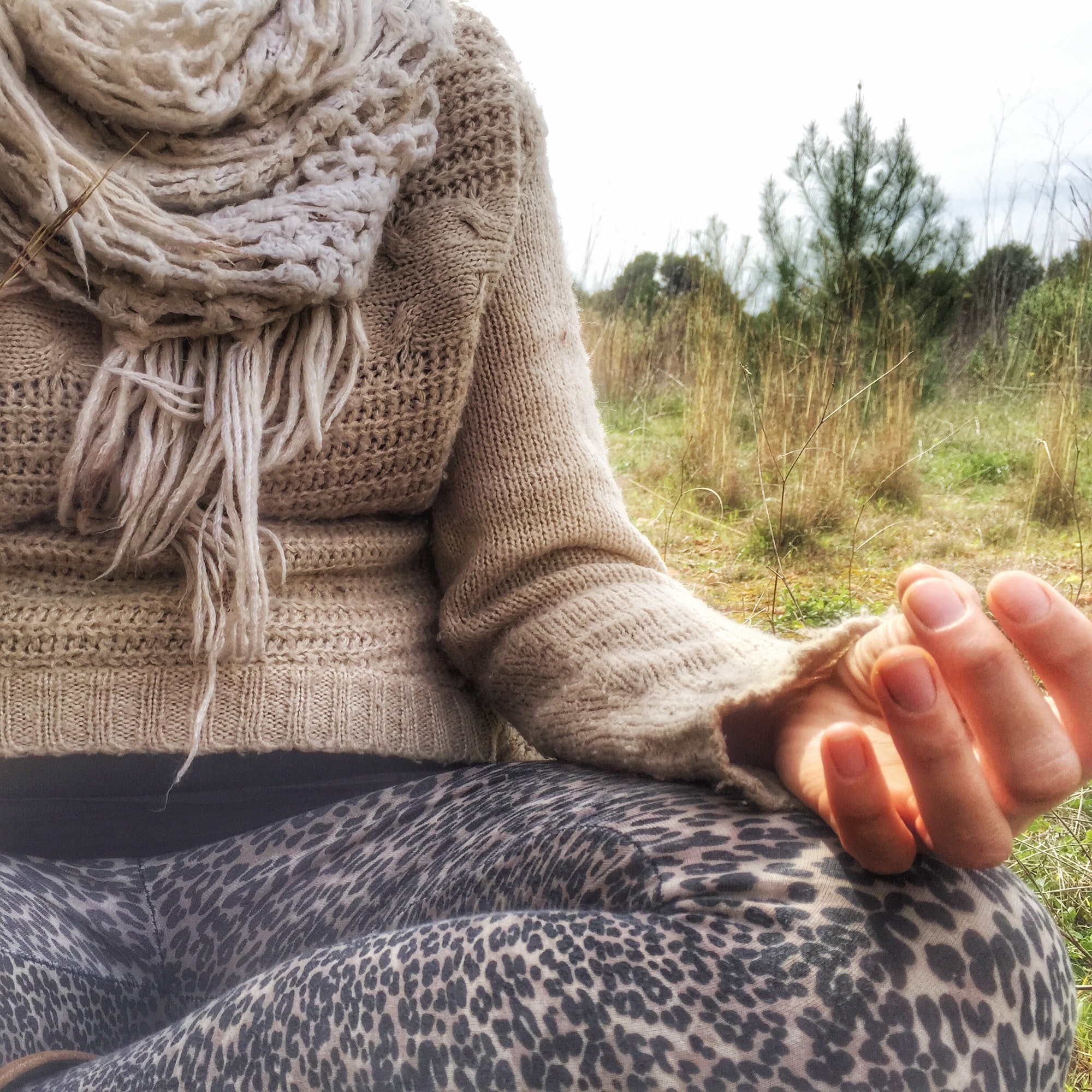 Women meditating in a field - Melanie Holden Psychic Energy Healer, Physical Therapist, and Reiki Master Teacher